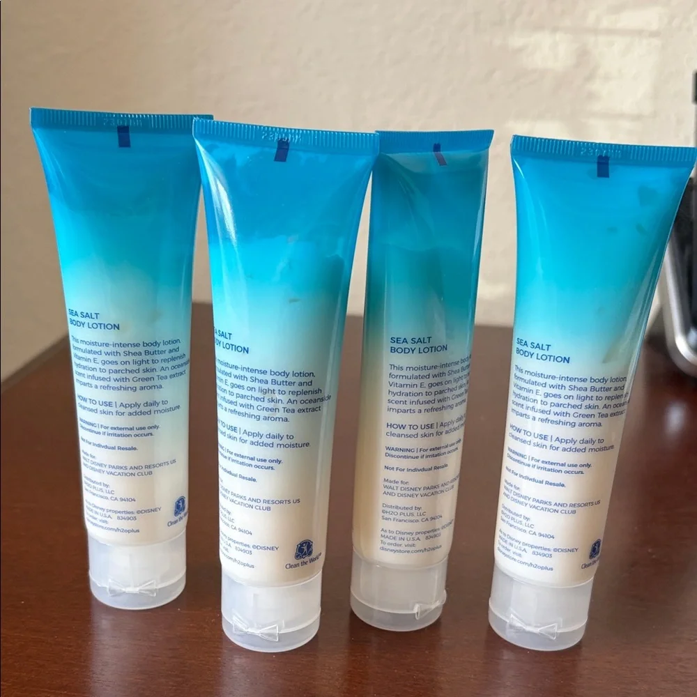 Disney H2O+ Sea Salt Body Lotion - White. Set of 4. Two ounces each. New - Picture 2 of 2